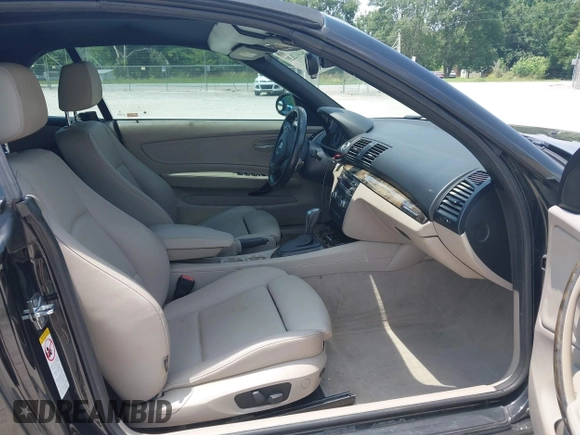 2009 BMW 1 Series 135i with VIN WBAUN93569VK40357, listed as a IAAI auction lot 42412038 with 141,944 mi miles and . Bid and sale history available at DreamBid. Image 5.