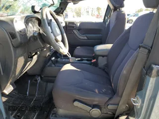2014 Jeep Wrangler Sport z VIN 1C4AJWAG0EL119835, wystawiony jako Copart lot #88498755 z przebiegiem 151 756 mil mil oraz Szkoda całkowita • Salvage title. Historia ofert i sprzedaży dostępna na DreamBid. Obrazek 7.
