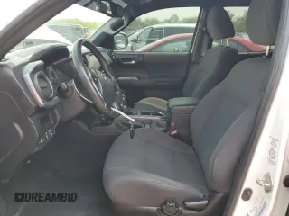 2017 Toyota Tacoma SR5 with VIN 3TMCZ5AN7HM105170, listed as a Copart auction lot 57628685 with 52,654 mi miles and Salvage title. Bid and sale history available at DreamBid. Image 7.