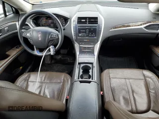 2014 Lincoln MKZ z VIN 3LN6L2G93ER811683, wystawiony jako Copart lot #52004485 z przebiegiem 188 134 mil mil oraz Szkoda całkowita • Salvage title. Historia ofert i sprzedaży dostępna na DreamBid. Obrazek 8.