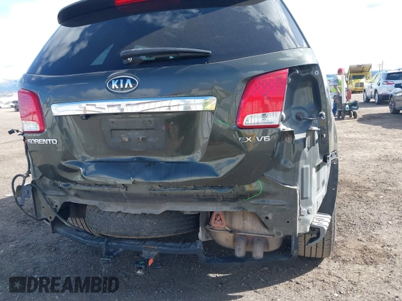 2013 Kia Sorento EX with VIN 5XYKUDA24DG331006, listed as a IAAI auction lot 41998319 with 143,141 mi miles. Bid and sale history available at carsss.com. Image 6.