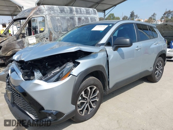 2023 Toyota Corolla Cross Hybrid S with VIN 7MUFBABG1PV014992, listed as a IAAI auction lot 42202656 with 18,913 mi miles and . Bid and sale history available at DreamBid. Image 2.