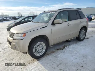 2009 Suzuki Grand Vitara z VIN JS3TD042194100029, wystawiony jako Copart lot #82861974 z przebiegiem 181 920 mil mil oraz Czysty tytuł • Clean title. Historia ofert i sprzedaży dostępna na DreamBid. Obrazek 1.