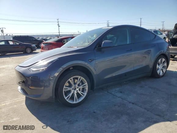 2023 Tesla Model Y Long Range with VIN 7SAYGDEE5PA037129, listed as a Copart auction lot 45775925 with 50,565 mi miles and Salvage Title. Bid and sale history available at carsss.com. Image 1.