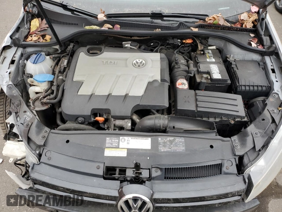 2011 Volkswagen Golf TDI z VIN WVWBM7AJ7BW119600, wystawiony jako Copart lot #77469554 z przebiegiem 177 711 mil mil oraz Szkoda całkowita • Salvage title. Historia ofert i sprzedaży dostępna na DreamBid. Obrazek 11.