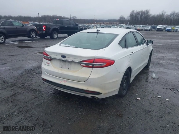 2017 Ford Fusion S with VIN 3FA6P0G77HR235084, listed as a IAAI auction lot 41582306 with 113,325 mi miles. Bid and sale history available at carsss.com. Image 4.