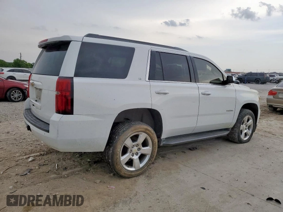 2016 Chevrolet Tahoe LT z VIN 1GNSKBKC7GR256834, wystawiony jako Copart lot #58178715 z przebiegiem 218 946 mil mil oraz Szkoda całkowita • Salvage title. Historia ofert i sprzedaży dostępna na DreamBid. Obrazek 3.