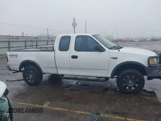 1997 Ford F-150 XL with VIN 1FTDX1863VNB01474, listed as a IAAI auction lot 41446672 with 223,296 mi miles. Bid and sale history available at carsss.com. Image 13.