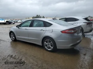 2016 Ford Fusion SE Hybrid with VIN 3FA6P0LU8GR261476, listed as a Copart auction lot 45362235 with 164,507 mi miles and Salvage Title. Bid and sale history available at carsss.com. Image 2.