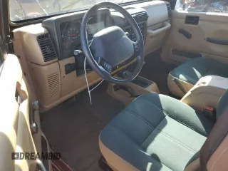 2002 Jeep Wrangler Sahara with VIN 1J4FA59S92P708647, listed as a Copart auction lot 74851654 with 131,794 mi miles and Salvage Title. Bid and sale history available at carsss.com. Image 8.