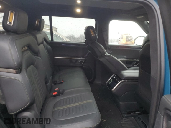 2024 Rivian R1S Adventure z VIN 7PDSGABA1RN031444, wystawiony jako Copart lot #43312765 z przebiegiem Nie podano mil oraz Szkody całkowita. Historia ofert i sprzedaży dostępna na DreamBid. Obrazek 11.