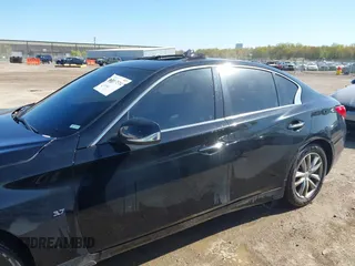 2015 Infiniti Q50 Premium with VIN JN1BV7AR2FM396677, listed as a IAAI auction lot 42017514 with 98,967 mi miles. Bid and sale history available at carsss.com. Image 13.