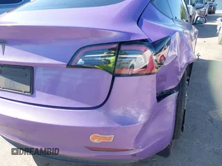 2020 Tesla Model 3 Standard Range Plus with VIN 5YJ3E1EA0LF739462, listed as a IAAI auction lot 42081889 with 65,254 mi miles. Bid and sale history available at carsss.com. Image 19.