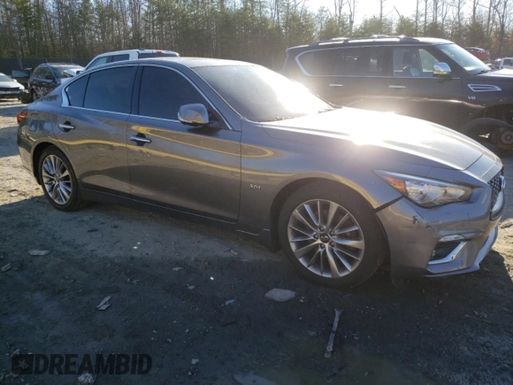 2020 Infiniti Q50 with VIN JN1EV7AR9LM256845, listed as a Copart auction lot 48957995 with 56,980 mi miles and Salvage Title. Bid and sale history available at DreamBid. Image 4.