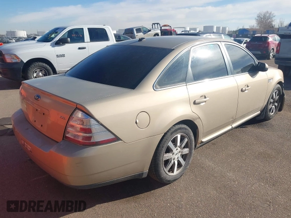 2008 Ford Taurus SEL with VIN 1FAHP24W38G111319, listed as a IAAI auction lot 41585092 with 216,419 mi miles. Bid and sale history available at carsss.com. Image 4.