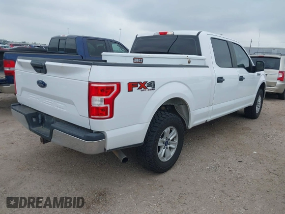 2018 Ford F-150 XL with VIN 1FTFW1E58JKE22834, listed as a IAAI auction lot 41923960 with 214,459 mi miles. Bid and sale history available at carsss.com. Image 4.