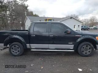 2013 Ford F-150 XL with VIN 1FTFW1ET1DFA13392, listed as a IAAI auction lot 41834459 with 153,797 mi miles and . Bid and sale history available at carsss.com. Image 14.