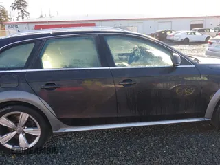 2014 Audi allroad Premium Plus with VIN WA1UFAFL1EA156213, listed as a IAAI auction lot 41610274 with 115,688 mi miles. Bid and sale history available at carsss.com. Image 13.