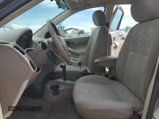 2005 Ford Focus S with VIN 1FAFP34NX5W263944, listed as a Copart auction lot 52973945 with 201,348 mi miles and Salvage Title. Bid and sale history available at carsss.com. Image 7.