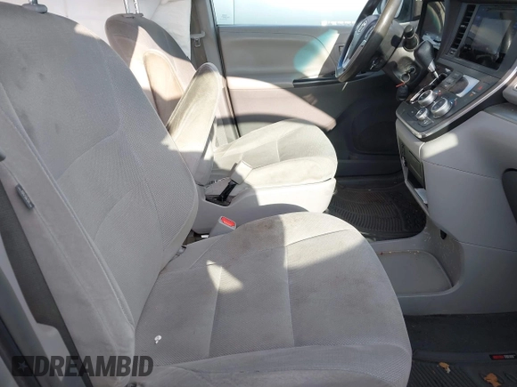 2015 Toyota Sienna L with VIN 5TDZK3DCXFS596277, listed as a IAAI auction lot 41229427 with 108,900 mi miles and . Bid and sale history available at DreamBid. Image 5.