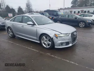2016 Audi A6 2.0T Premium Plus with VIN WAUGFAFC2GN124964, listed as a IAAI auction lot 41393796 with 100,263 mi miles. Bid and sale history available at carsss.com. Image 1.