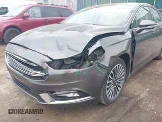 2017 Ford Fusion Titanium with VIN 3FA6P0K96HR208757, listed as a IAAI auction lot 42400172 with 90,000 mi miles and . Bid and sale history available at DreamBid. Image 6.