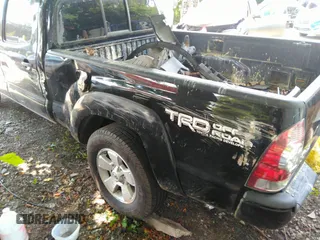 2014 Toyota Tacoma with VIN 3TMMU4FN6EM072471, listed as a IAAI auction lot 42525218 with 150,461 mi miles and . Bid and sale history available at DreamBid. Image 3.