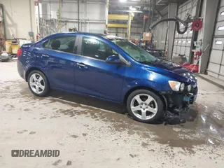 2014 Chevrolet Sonic LTZ with VIN 1G1JE5SB5E4226187, listed as a IAAI auction lot 41521689 with 73,325 mi miles. Bid and sale history available at carsss.com. Image 1.