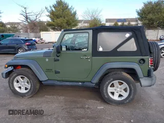 2016 Jeep Wrangler Sport with VIN 1C4AJWAG7GL330159, listed as a IAAI auction lot 41530415 with 98,554 mi miles and . Bid and sale history available at carsss.com. Image 14.