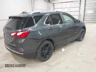 2021 Chevrolet Equinox LT with VIN 3GNAXUEV2ML375190, listed as a IAAI auction lot 41991148 with 60,016 mi miles and . Bid and sale history available at DreamBid. Image 4.