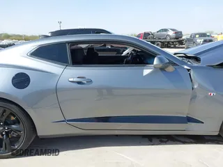 2021 Chevrolet Camaro 1LT z VIN 1G1FB1RX9M0125698, wystawiony jako IAAI lot #41824653 z przebiegiem 69 365 mil mil oraz . Historia ofert i sprzedaży dostępna na DreamBid. Obrazek 14.