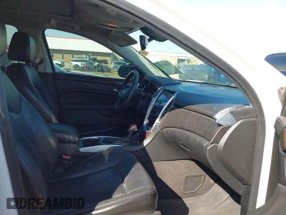 2014 Cadillac SRX Performance Collection with VIN 3GYFNCE31ES646075, listed as a IAAI auction lot 41856378 with 172,379 mi miles. Bid and sale history available at carsss.com. Image 5.