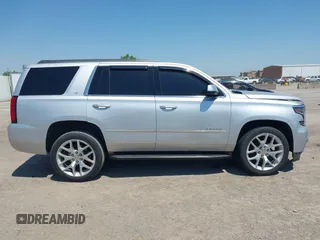 2015 Chevrolet Tahoe LT with VIN 1GNSCBKC6FR303850, listed as a IAAI auction lot 42254115 with 147,856 mi miles and . Bid and sale history available at DreamBid. Image 13.
