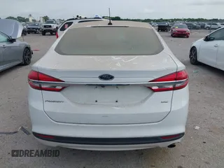2018 Ford Fusion SE with VIN 3FA6P0H79JR198057, listed as a IAAI auction lot 41815410 with 174,746 mi miles and . Bid and sale history available at DreamBid. Image 16.