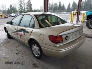 2002 Saturn SL z VIN 1G8ZH52852Z155698, wystawiony jako IAAI lot #41712058 z przebiegiem 90 150 mil mil oraz . Historia ofert i sprzedaży dostępna na DreamBid. Obrazek 3.