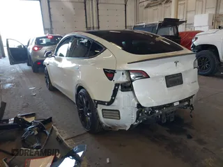 2021 Tesla Model Y Performance with VIN 5YJYGDEF4MF263473, listed as a IAAI auction lot 41851083 with 39,289 mi miles and . Bid and sale history available at DreamBid. Image 3.