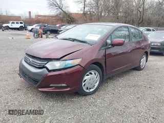 2011 Honda Insight LX z VIN JHMZE2H52BS004304, wystawiony jako IAAI lot #41827541 z przebiegiem 141 072 mil mil oraz . Historia ofert i sprzedaży dostępna na DreamBid. Obrazek 2.