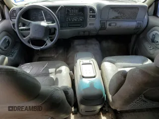 1999 Chevrolet Suburban with VIN 3GNEC16R7XG141671, listed as a Copart auction lot 77784174 with 207,234 mi miles and Salvage Title. Bid and sale history available at carsss.com. Image 8.