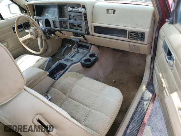 1992 Jeep Cherokee z VIN 1J4FJ27S0NL216957, wystawiony jako Copart lot #52689055 z przebiegiem 226 581 mil mil oraz Szkoda całkowita • Salvage title. Historia ofert i sprzedaży dostępna na DreamBid. Obrazek 10.