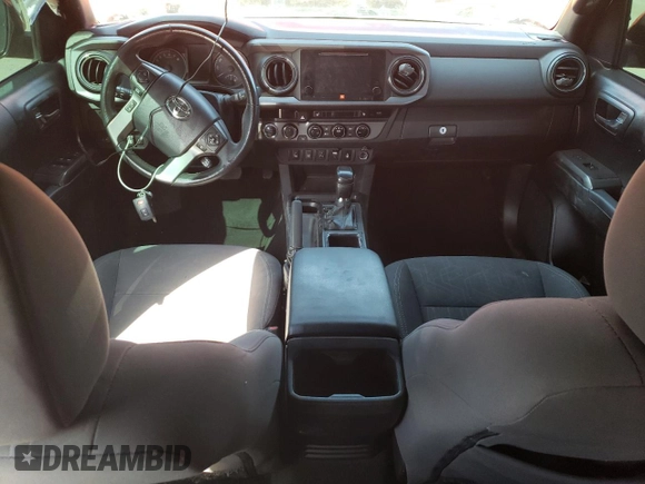 2017 Toyota Tacoma SR5 z VIN 3TMCZ5AN1HM096157, wystawiony jako Copart lot #74628764 z przebiegiem 91 998 mil mil oraz Szkoda całkowita • Salvage title. Historia ofert i sprzedaży dostępna na DreamBid. Obrazek 8.