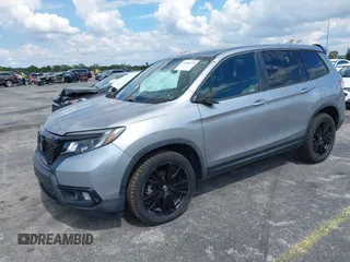 2021 Honda Passport Sport with VIN 5FNYF8H24MB004016, listed as a IAAI auction lot 41696379 with 85,373 mi miles and . Bid and sale history available at DreamBid. Image 19.