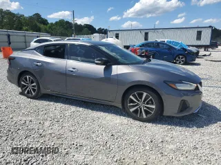 2021 Nissan Maxima SV with VIN 1N4AA6CV1MC511111, listed as a Copart auction lot 58222325 with 29,423 mi miles and Salvage title. Bid and sale history available at DreamBid. Image 4.