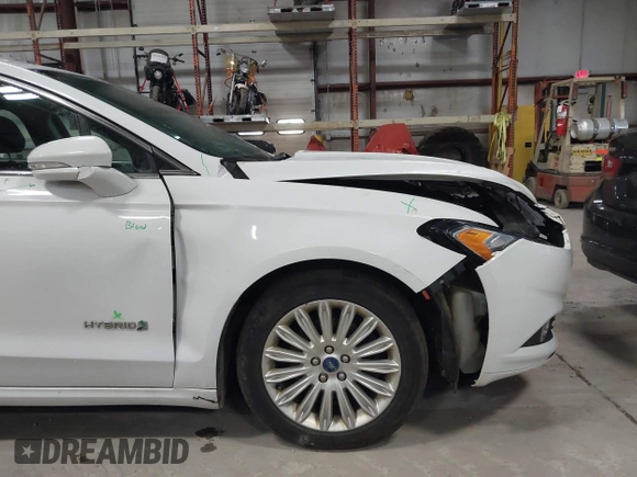 2013 Ford Fusion SE Hybrid with VIN 3FA6P0LU7DR254983, listed as a IAAI auction lot 41883531 with 188,585 mi miles and . Bid and sale history available at carsss.com. Image 12.