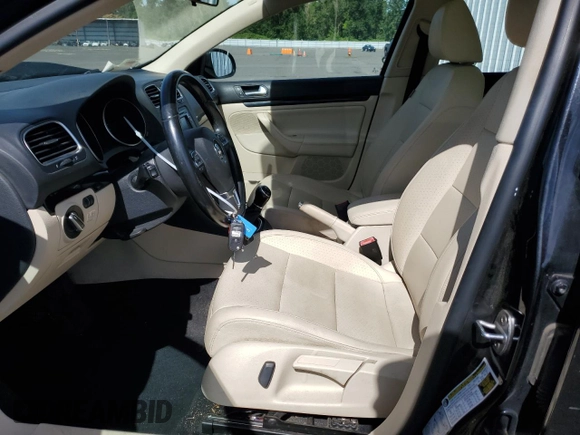 2014 Volkswagen Jetta SportWagen TDI w/Sunroof with VIN 3VWML7AJ3EM627415, listed as a Copart auction lot 70838324 with 101,616 mi miles and Salvage Title. Bid and sale history available at carsss.com. Image 7.
