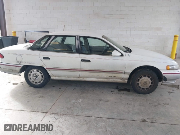 1992 Mercury Sable z VIN 1MECM5049NG647978, wystawiony jako IAAI lot #41805346 z przebiegiem 23 634 mil mil oraz . Historia ofert i sprzedaży dostępna na DreamBid. Obrazek 13.