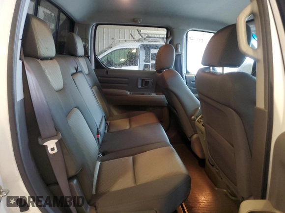 2006 Honda Ridgeline RTS z VIN 2HJYK16456H554437, wystawiony jako Copart lot #56571295 z przebiegiem 127 895 mil mil oraz Szkoda całkowita • Salvage title. Historia ofert i sprzedaży dostępna na DreamBid. Obrazek 10.