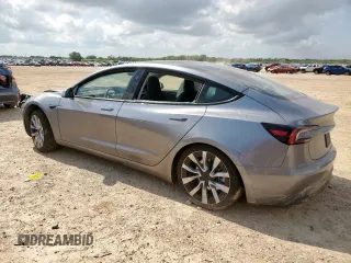 2025 Tesla Model 3 Long Range z VIN 5YJ3E1EA0SF878134, wystawiony jako Copart lot #59854975 z przebiegiem Nie podano mil oraz Szkoda całkowita • Salvage title. Historia ofert i sprzedaży dostępna na DreamBid. Obrazek 2.