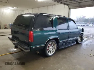 1998 GMC Yukon with VIN 1GKEC13RXWJ731667, listed as a Copart auction lot 78848954 with 202,164 mi miles and Salvage Title. Bid and sale history available at carsss.com. Image 3.