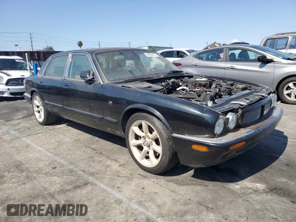 2003 Jaguar XJ with VIN SAJDA15B63MF52618, listed as a Copart auction lot 64336415 with Not provided miles and Clean title. Bid and sale history available at DreamBid. Image 4.