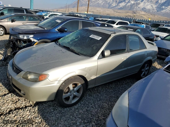 2003 Mazda Protege DX with VIN JM1BJ225431109585, listed as a Copart auction lot 88652505 with 246,348 mi miles and Salvage Title. Bid and sale history available at carsss.com. Image 1.